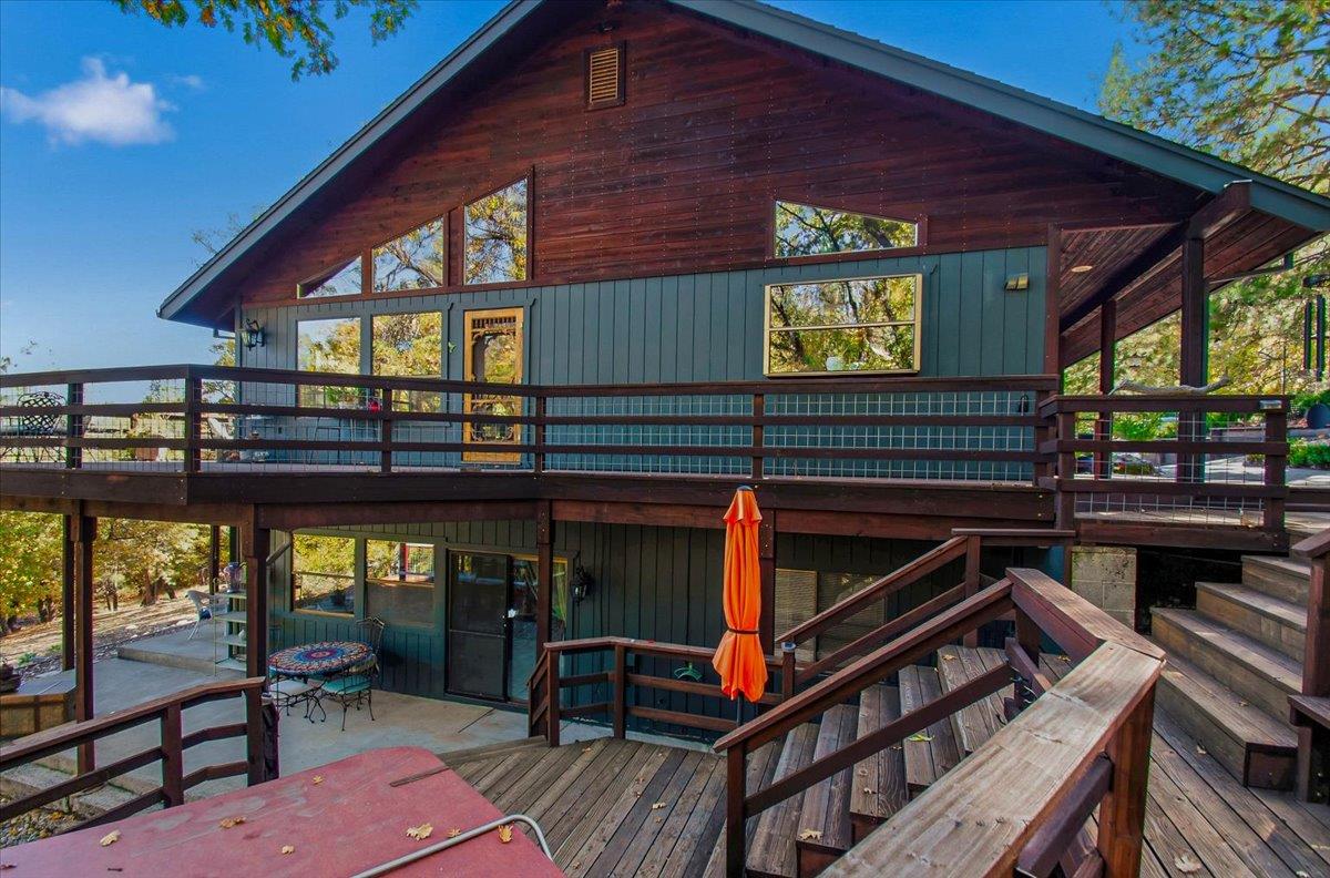 5617 Indian Hills Road Murphys, CA 95247 - Photo 59 of 80 a view of a chairs and table in a patio