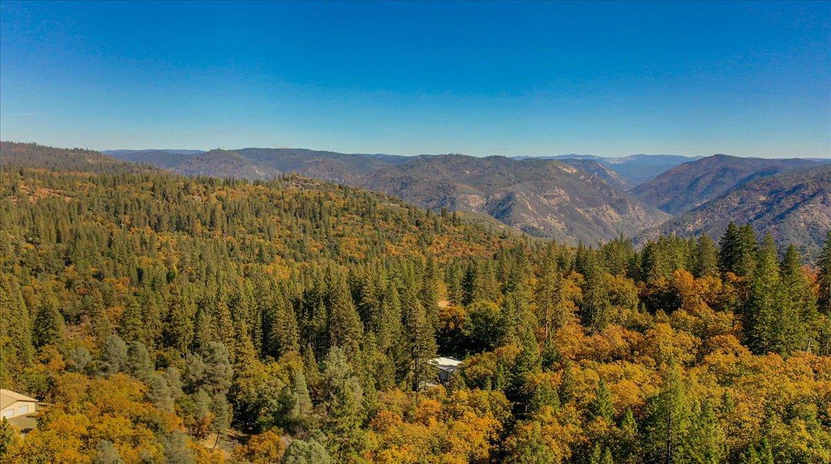 5617 Indian Hills Road Murphys, CA 95247 - Photo 75 of 80 a view of a city with mountains in the background