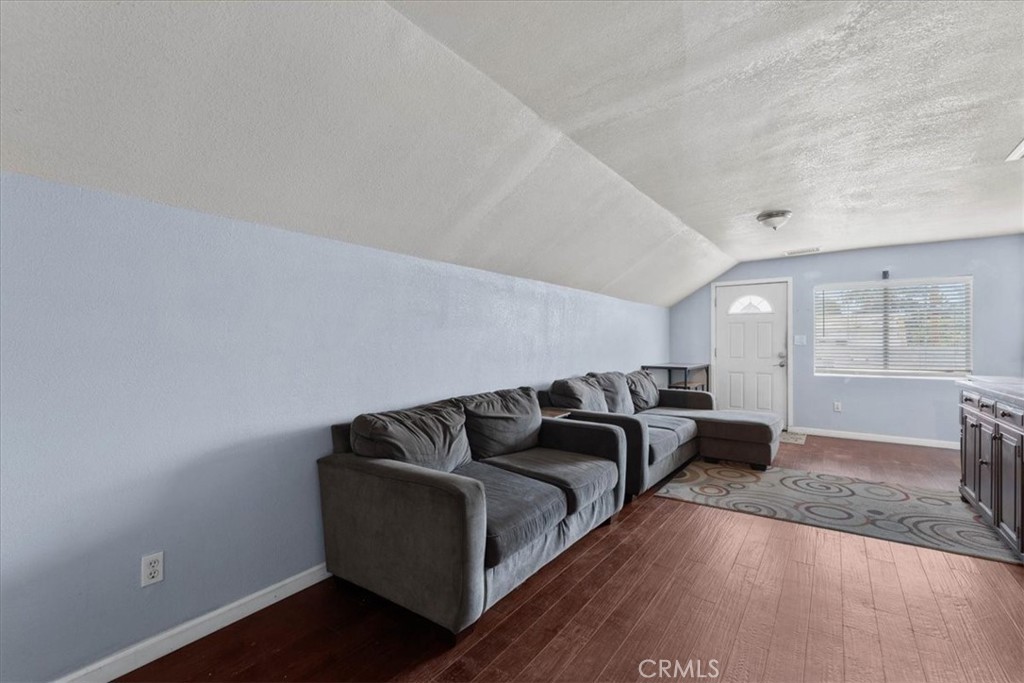 3974 5th Street Riverside, CA 92501 - Photo 32 of 45 a living room with furniture and a couch