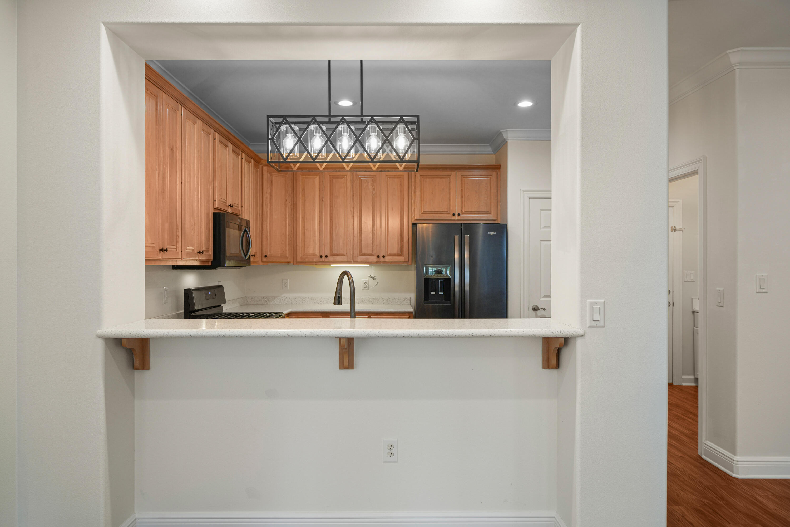4116 Callaway Drive Niceville, FL 32578 - Photo 19 of 53 a view of a kitchen from the hallway