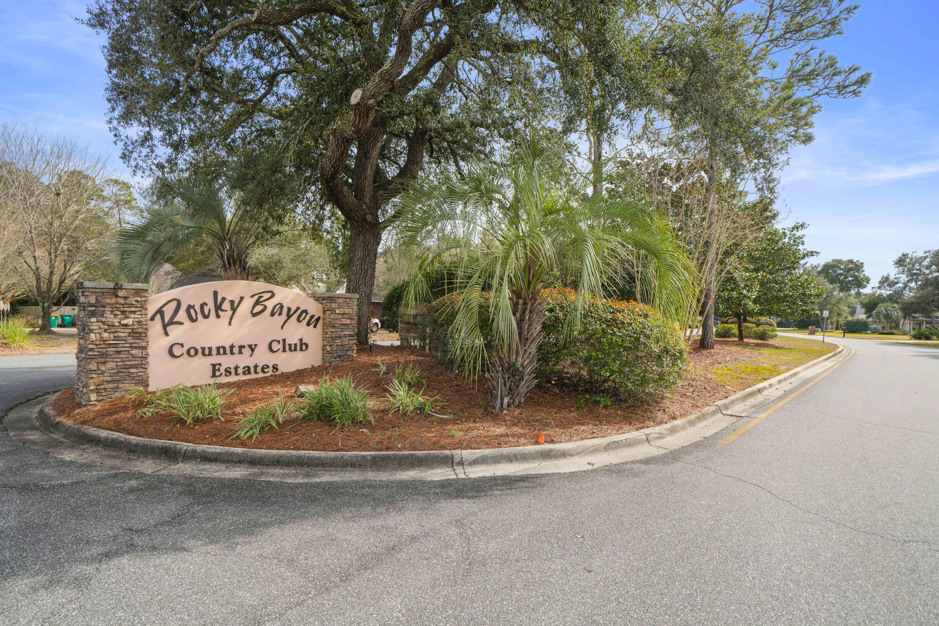 4116 Callaway Drive Niceville, FL 32578 - Photo 2 of 53 a view of a park with large trees
