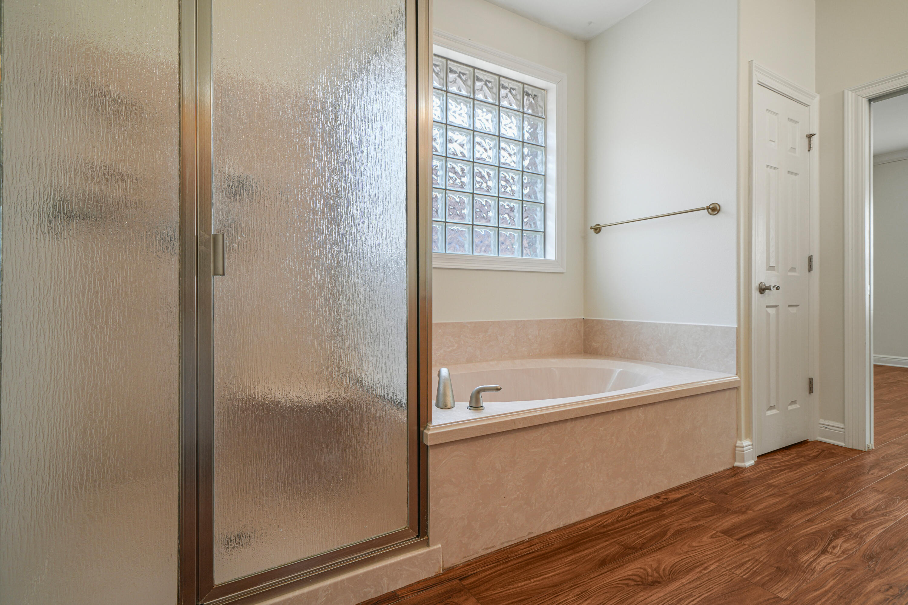 4116 Callaway Drive Niceville, FL 32578 - Photo 33 of 53 a bathroom with a tub a sink and a window