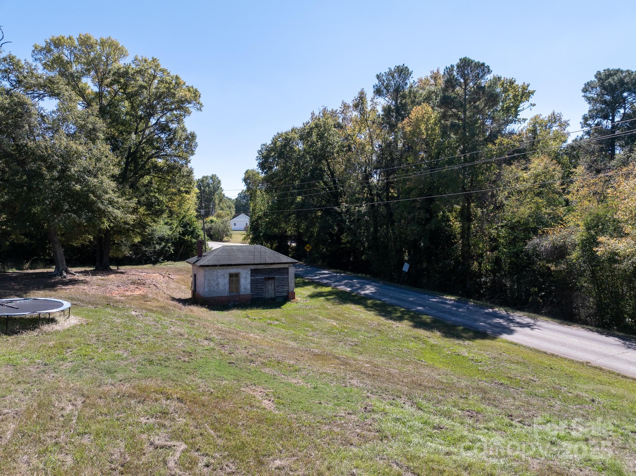 3062 Michelle Drive Blackstock, SC 29014 - Photo 13 of 23 a swimming pool with some trees in the background