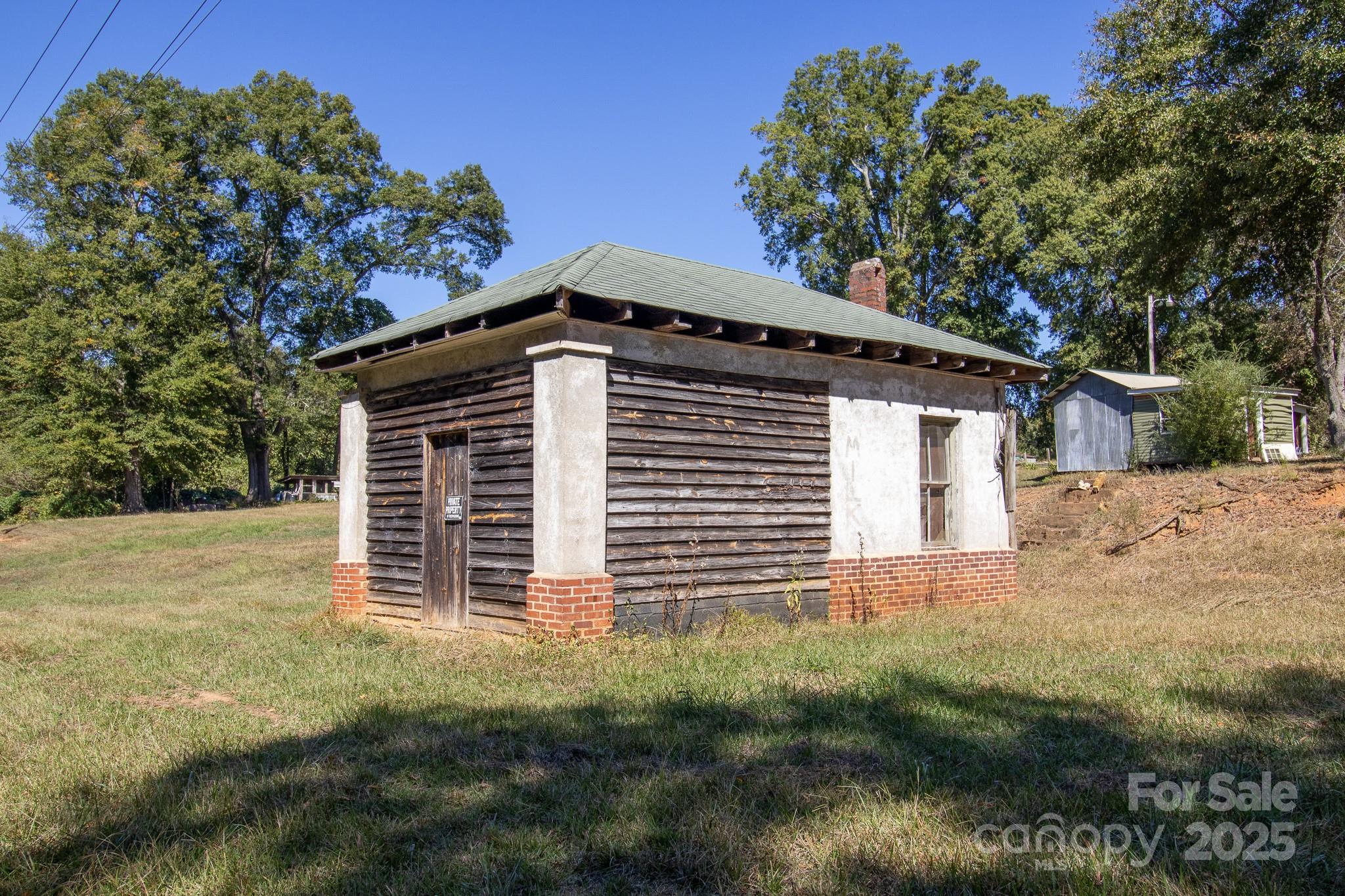3062 Michelle Drive Blackstock, SC 29014 - Photo 16 of 23 a front view of a house with a garden