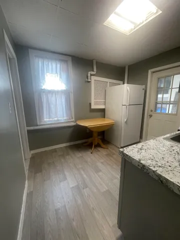 a room with storage and window