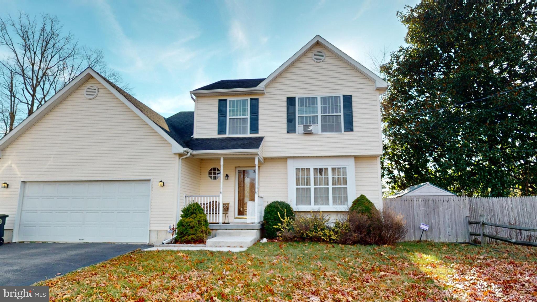2013 Good Intent Road Woodbury, NJ 08096 - Photo 3 of 28 a front view of a house with garden