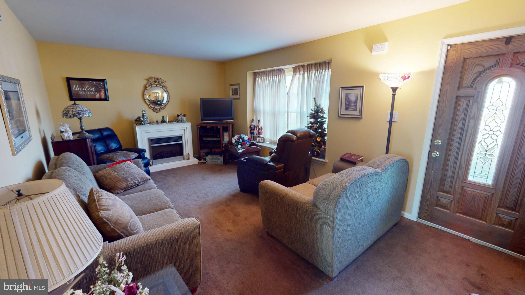 2013 Good Intent Road Woodbury, NJ 08096 - Photo 8 of 28 a living room with furniture or couch and a window