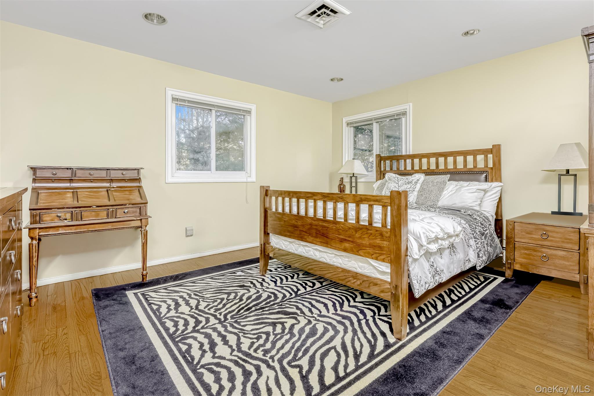 8 Kings Gate Road Suffern, NY 10901 - Photo 17 of 23 a bedroom with bed and a window