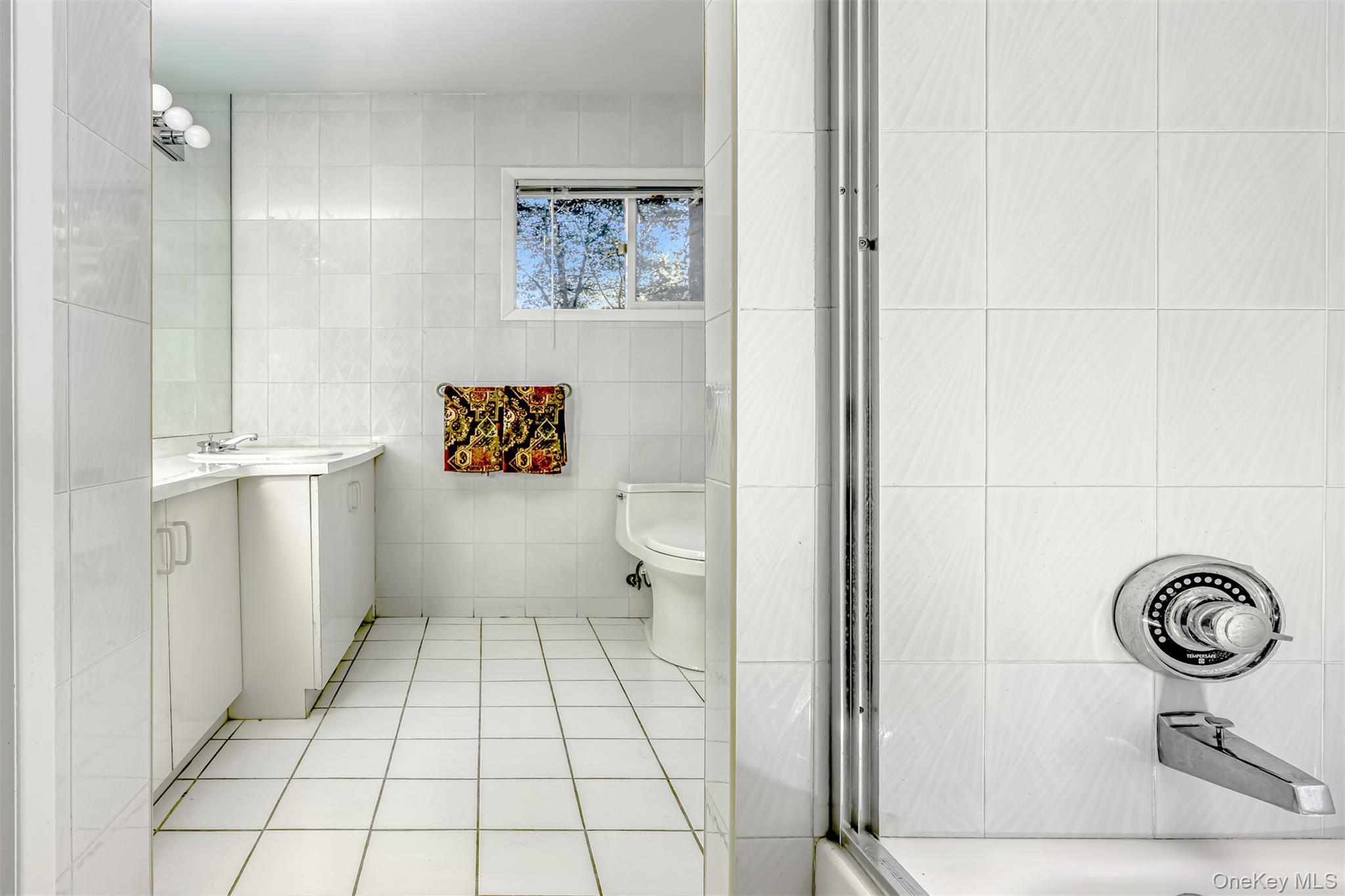8 Kings Gate Road Suffern, NY 10901 - Photo 18 of 23 a bathroom with a sink a toilet and a shower