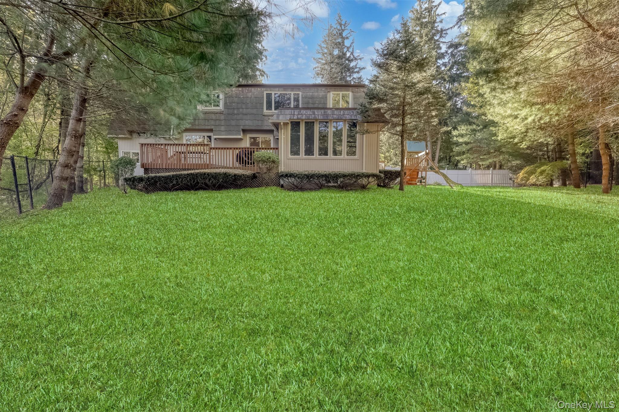 8 Kings Gate Road Suffern, NY 10901 - Photo 22 of 23 a view of a house with backyard and sitting area