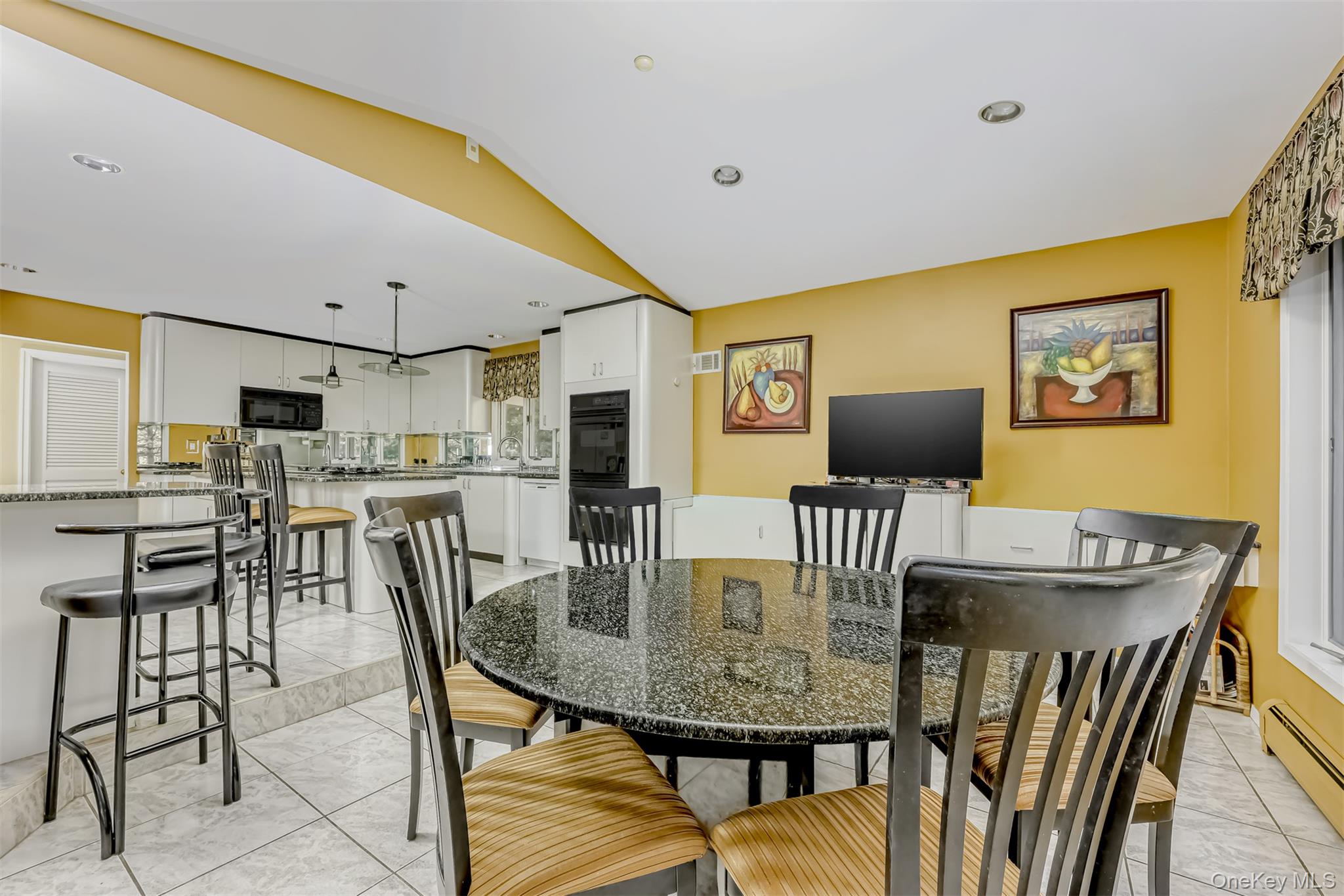8 Kings Gate Road Suffern, NY 10901 - Photo 8 of 23 a view of a dining room with furniture and wooden floor