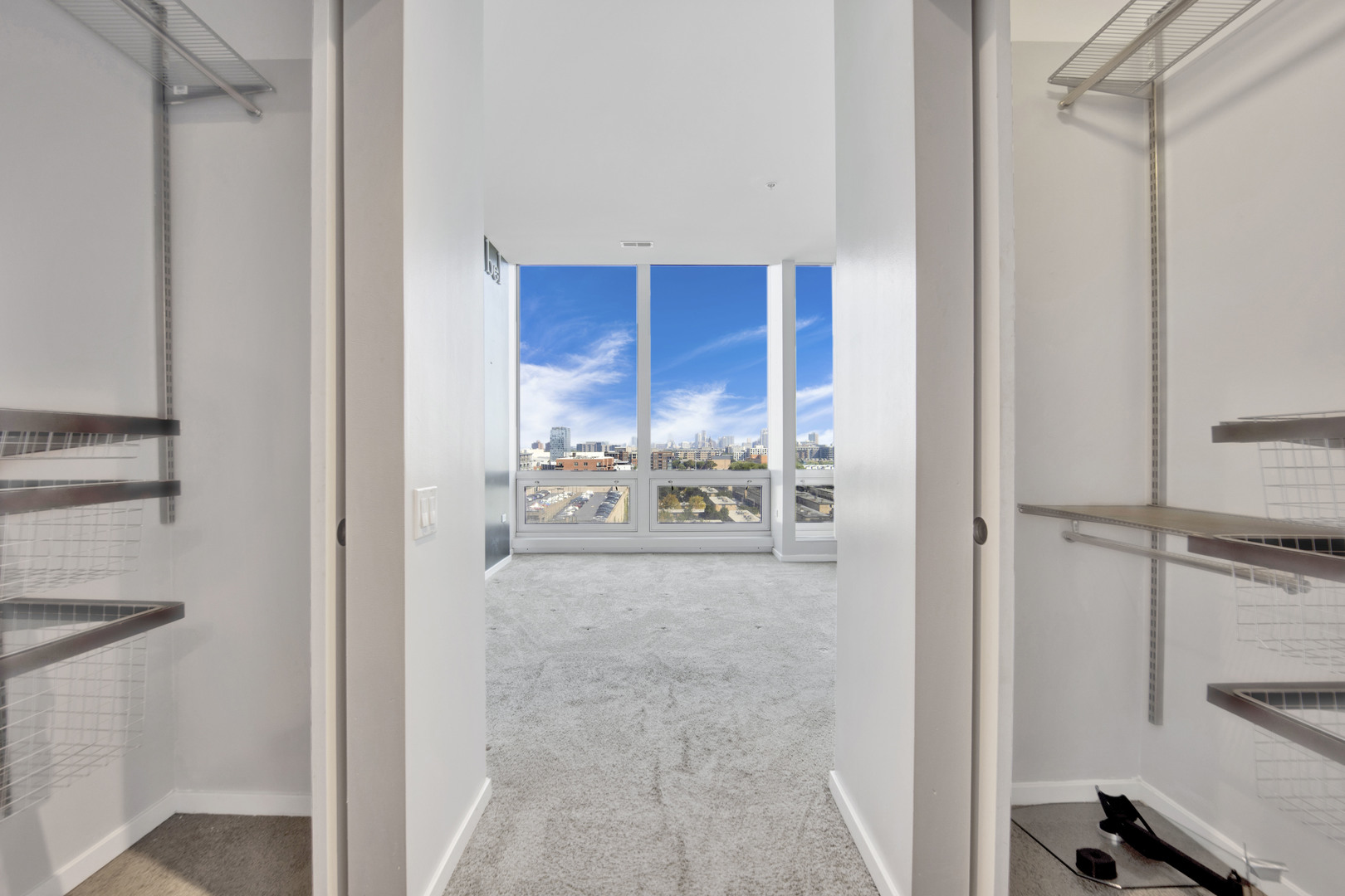 Undisclosed Address Chicago, IL 60654 - Photo 15 of 22 a view of a room that has a bed and with furniture