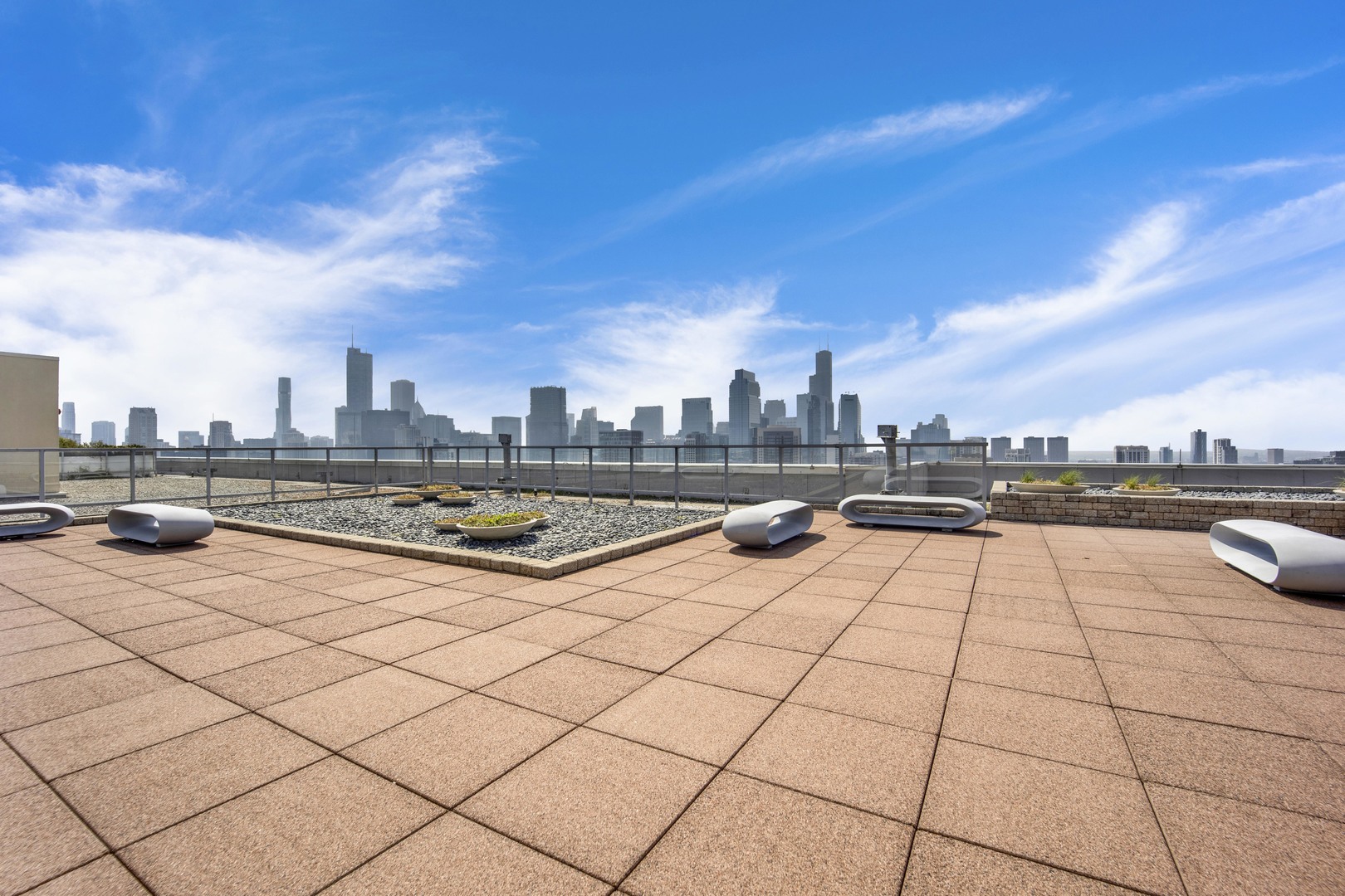 Undisclosed Address Chicago, IL 60654 - Photo 20 of 22 a view of a terrace with chairs