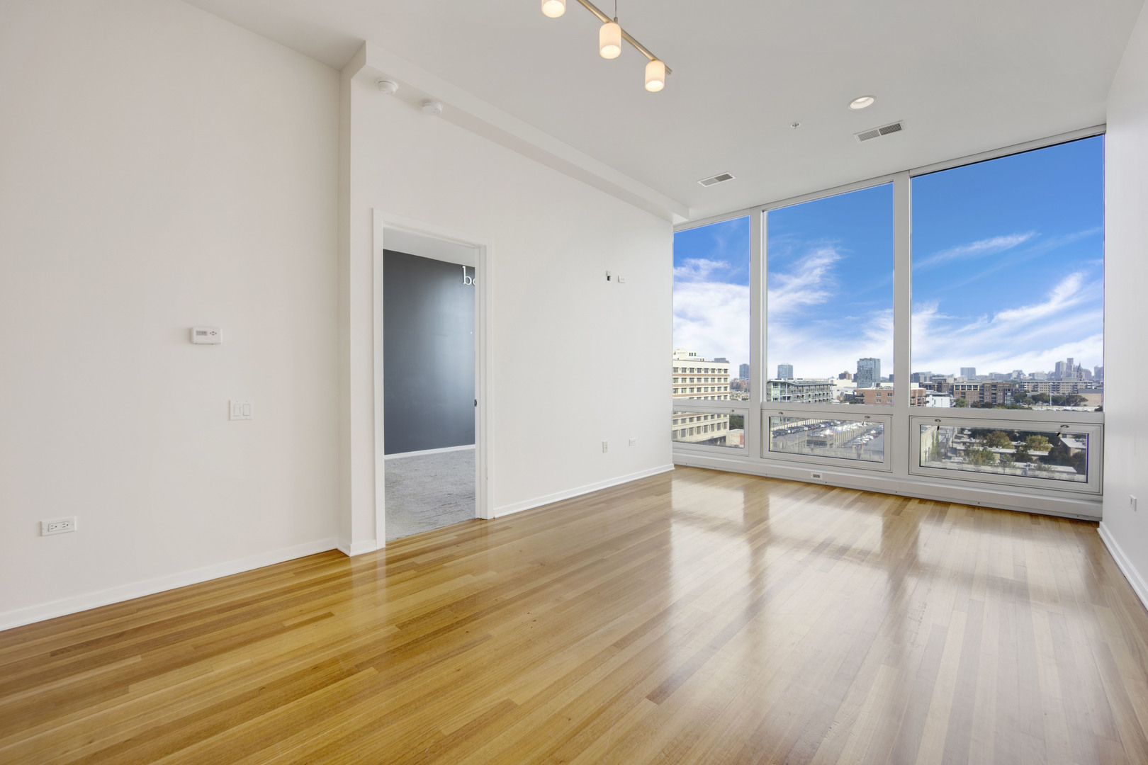 Undisclosed Address Chicago, IL 60654 - Photo 6 of 22 a view of a living room and kitchen view