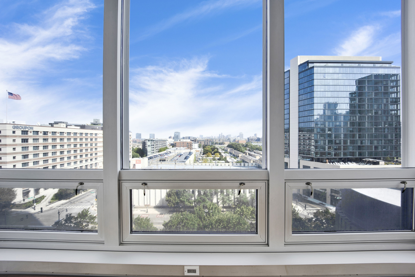 Undisclosed Address Chicago, IL 60654 - Photo 10 of 22 a view of a city from a window