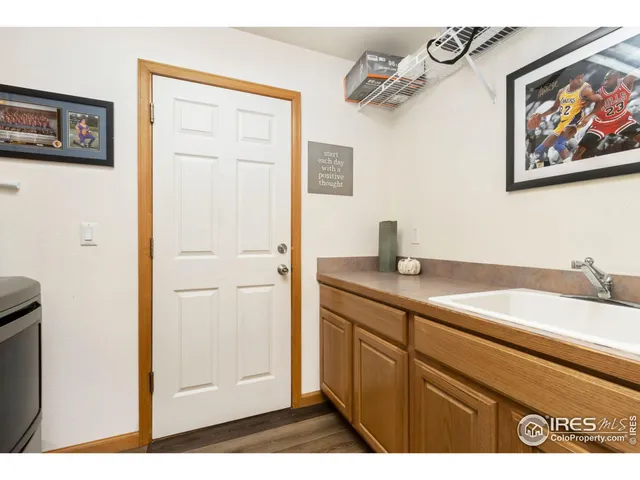 a bathroom with a sink a mirror and vanity