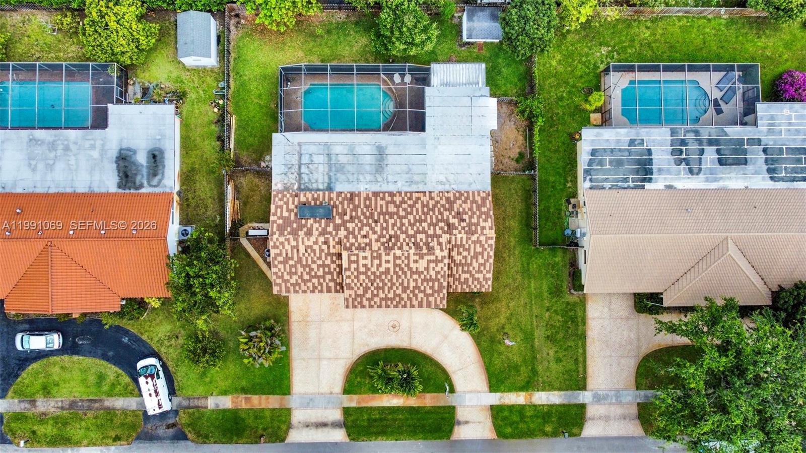 5171 Southwest 20th Street Plantation, FL 33317 - Photo 25 of 30 an aerial view of a house with garden space and signage