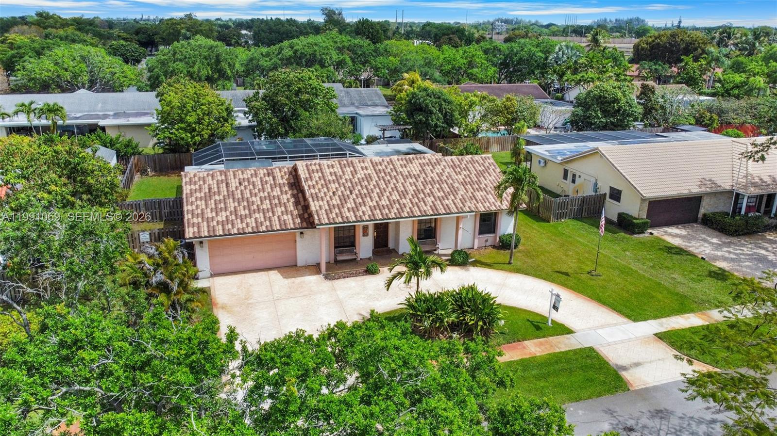 5171 Southwest 20th Street Plantation, FL 33317 - Photo 27 of 30 an aerial view of a house having patio with a garden