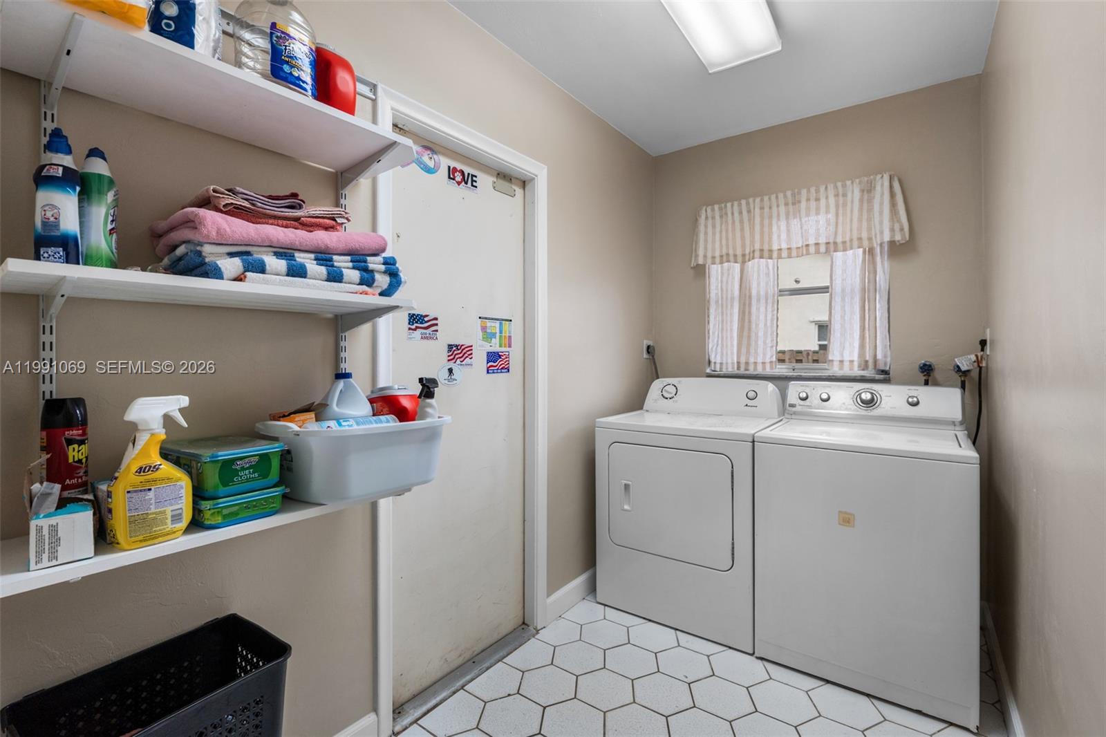 5171 Southwest 20th Street Plantation, FL 33317 - Photo 10 of 30 a utility room with dryer and washer