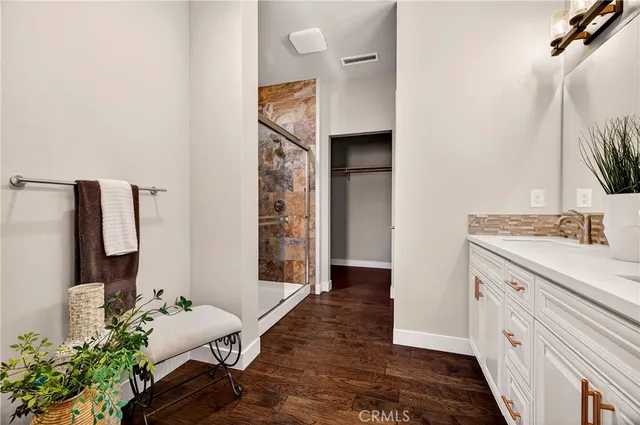 a bathroom with a bathtub and a sink