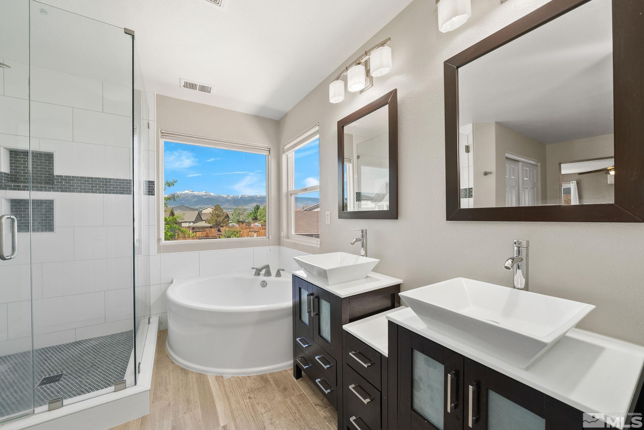2270 Big Trail Circle Reno, NV 89521 - Photo 24 of 40 a bathroom with a sink and a mirror