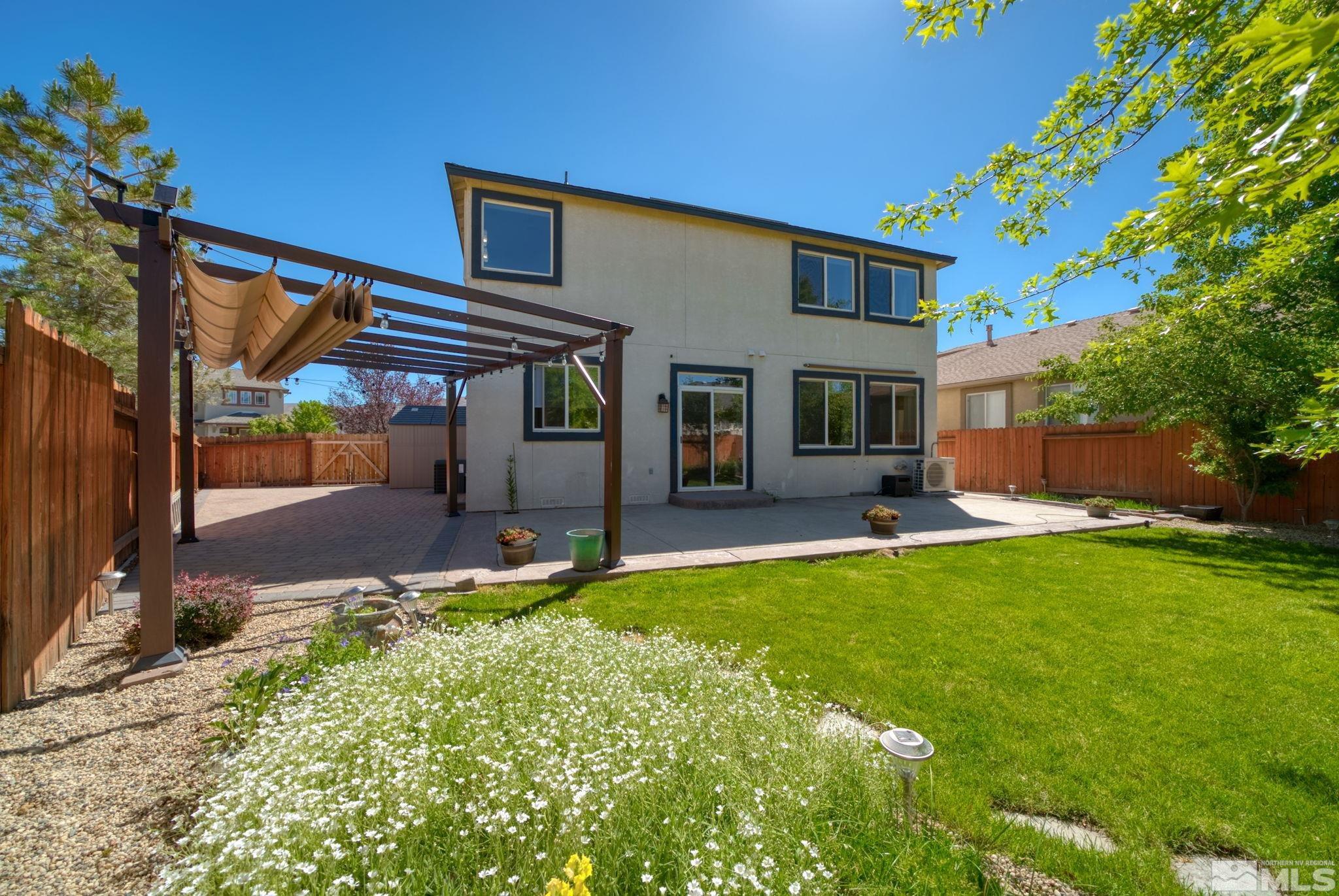 2270 Big Trail Circle Reno, NV 89521 - Photo 29 of 40 a front view of a house with a yard