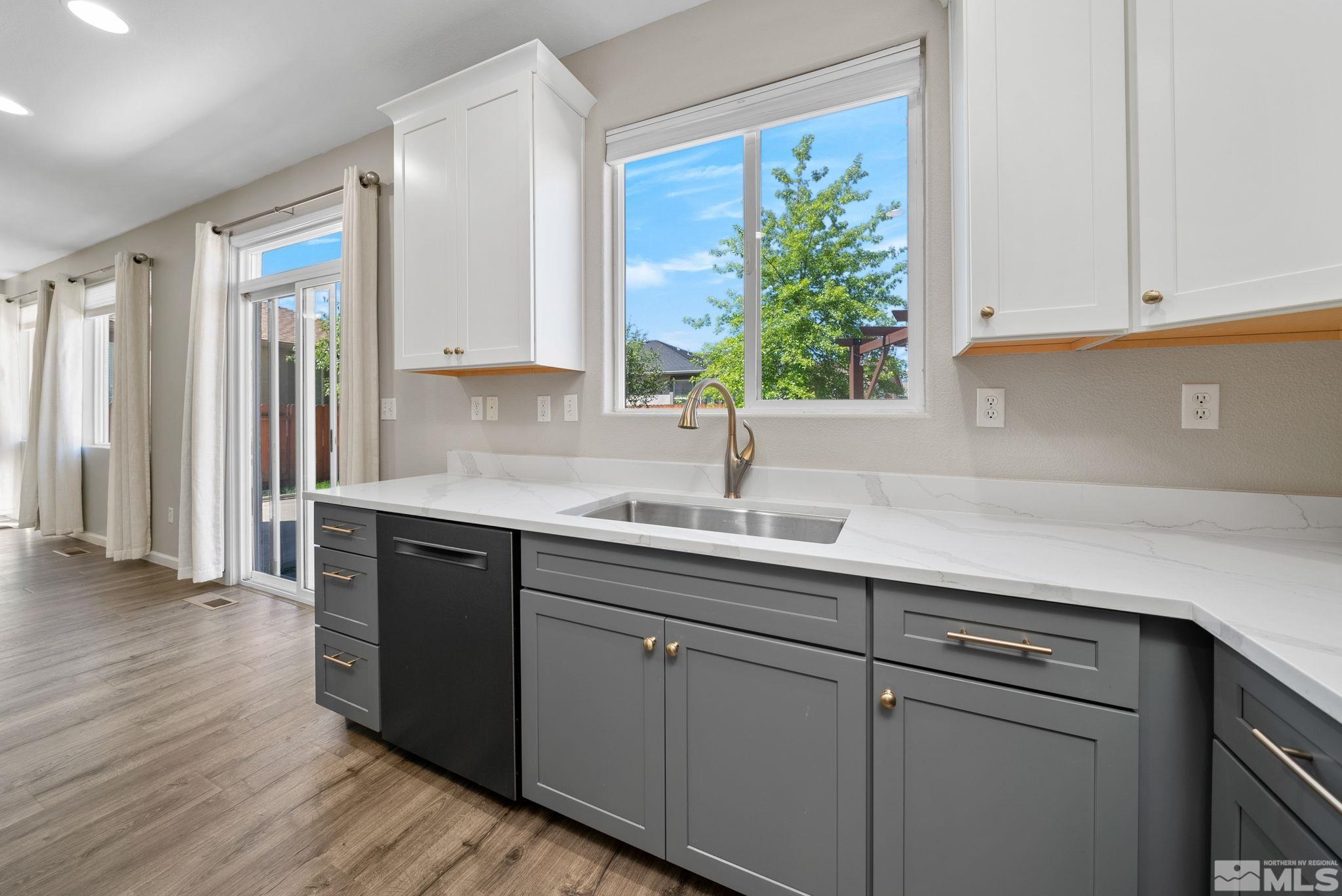 2270 Big Trail Circle Reno, NV 89521 - Photo 8 of 40 a kitchen with a sink and cabinets