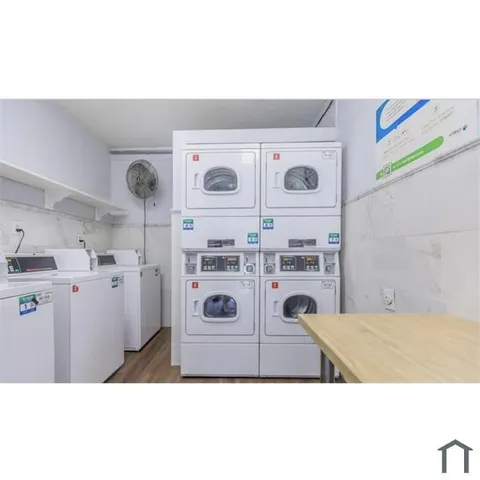 view of living room with furniture and window