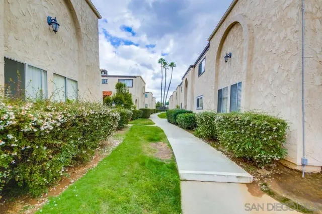 a view of a back yard of the house