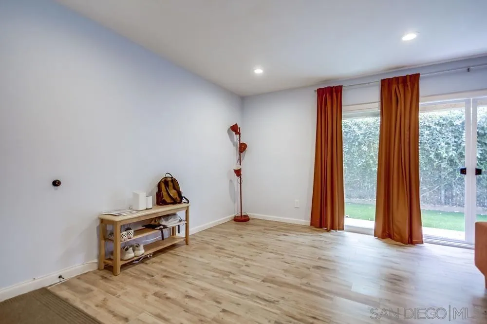 294 Chambers Street, Unit 45 El Cajon, CA 92020 - Photo 3 of 38 a view of a room with gym equipment and wooden floor