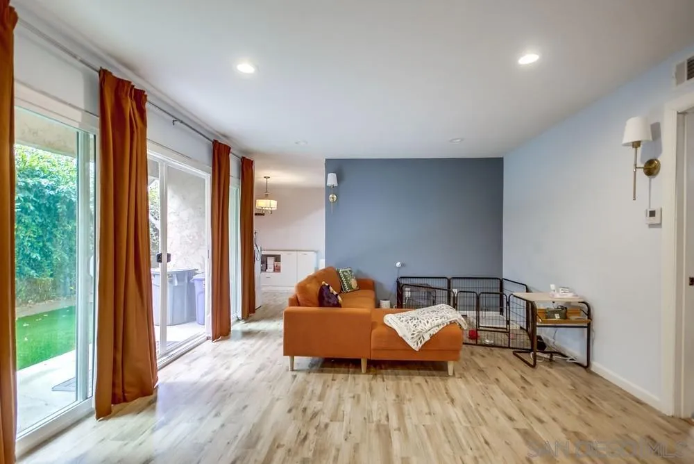 294 Chambers Street, Unit 45 El Cajon, CA 92020 - Photo 35 of 38 a living room with furniture and wooden floor