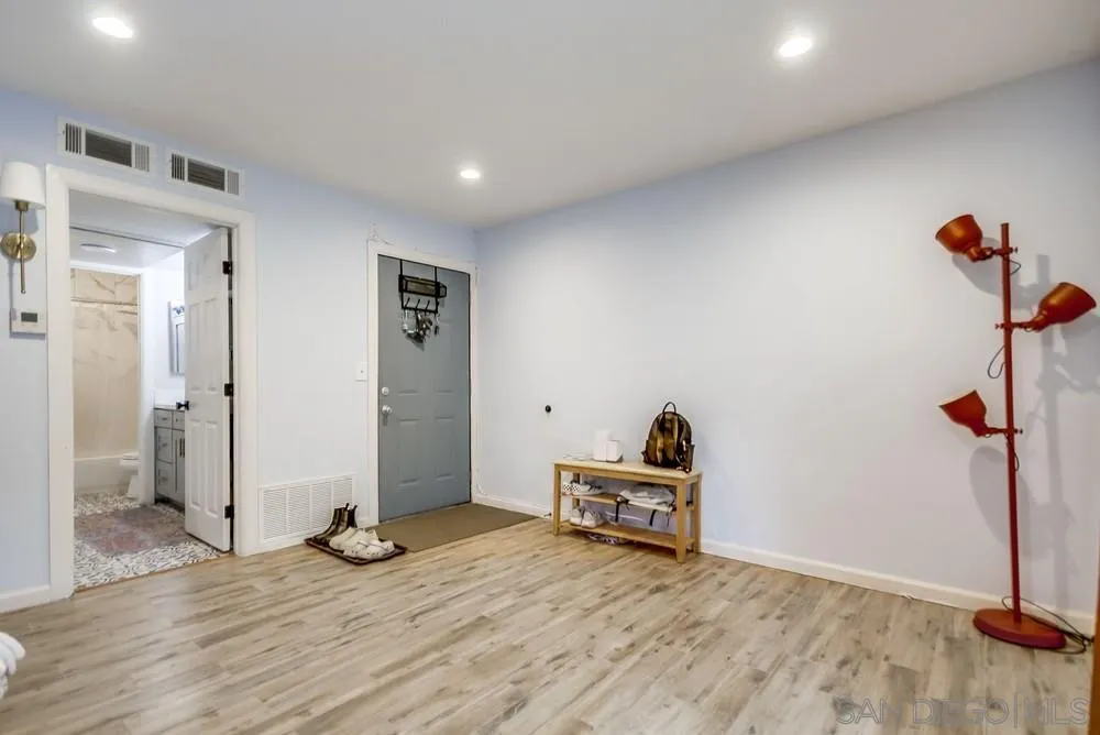 294 Chambers Street, Unit 45 El Cajon, CA 92020 - Photo 36 of 38 a view of a livingroom with wooden floor and closet