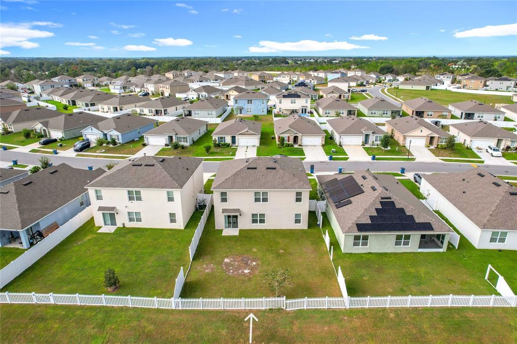 605 Honey Bell Road Winter Haven, FL 33880 - Photo 65 of 71 an aerial view of residential houses with outdoor space