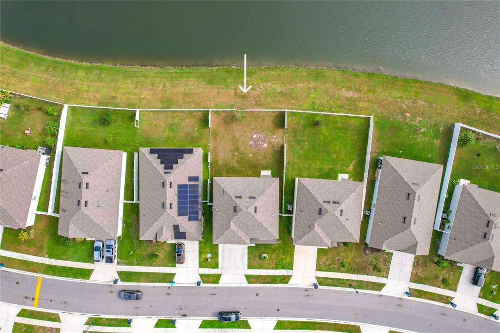 605 Honey Bell Road Winter Haven, FL 33880 - Photo 69 of 73 an aerial view of residential house with swimming pool