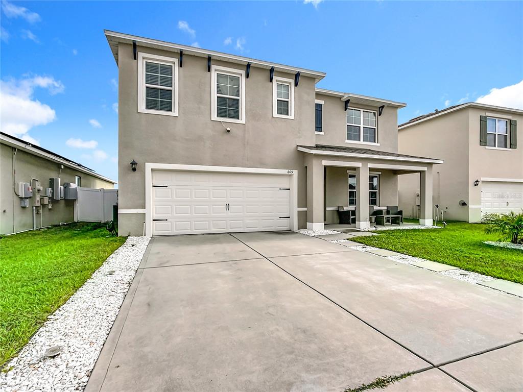 605 Honey Bell Road Winter Haven, FL 33880 - Photo 9 of 71 a front view of house with yard