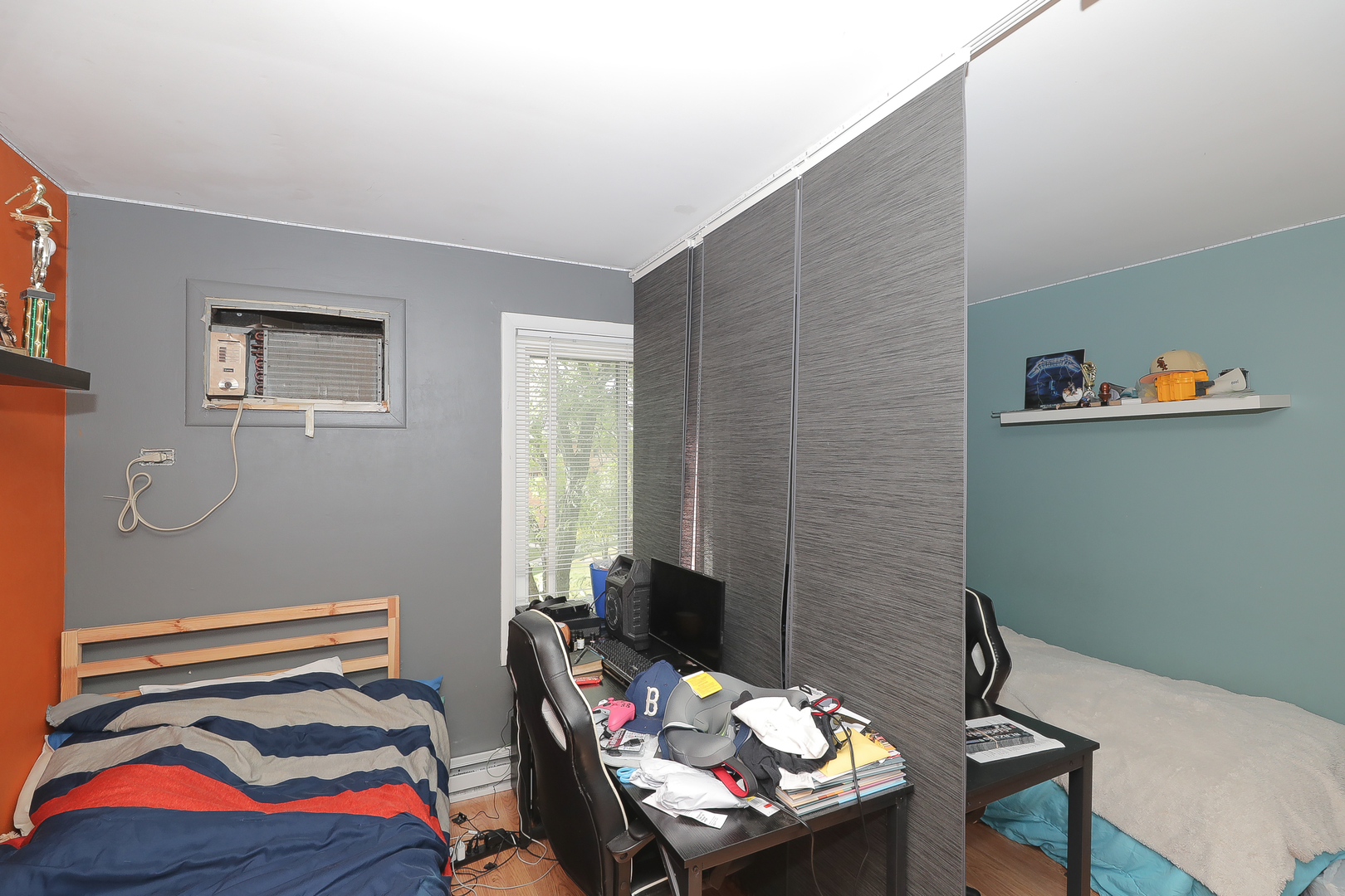 744 Briar Hill Lane, Unit 5 Addison, IL 60101 - Photo 12 of 20 a bedroom with a bed and a couch