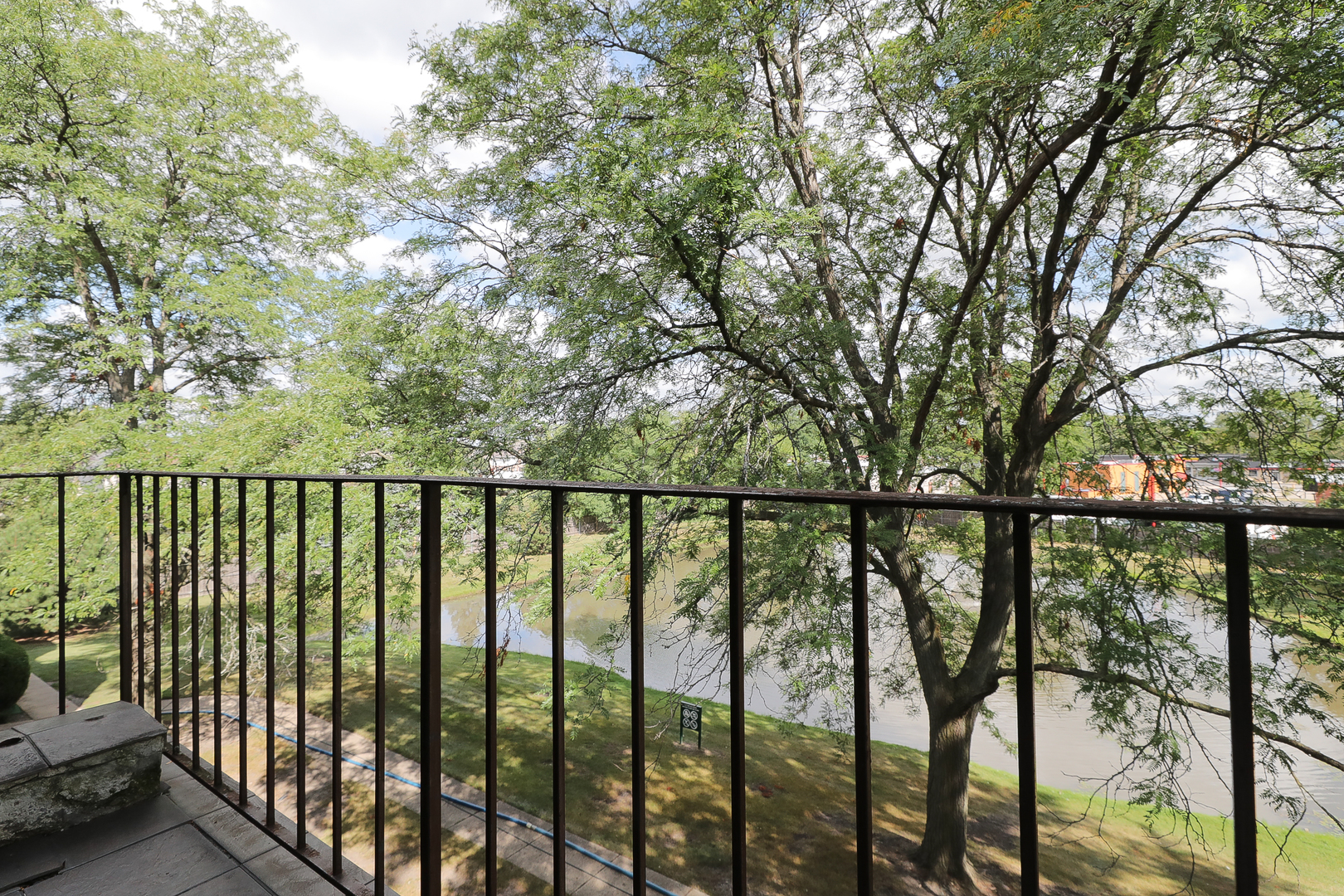 744 Briar Hill Lane, Unit 5 Addison, IL 60101 - Photo 19 of 20 a balcony with trees in front of it