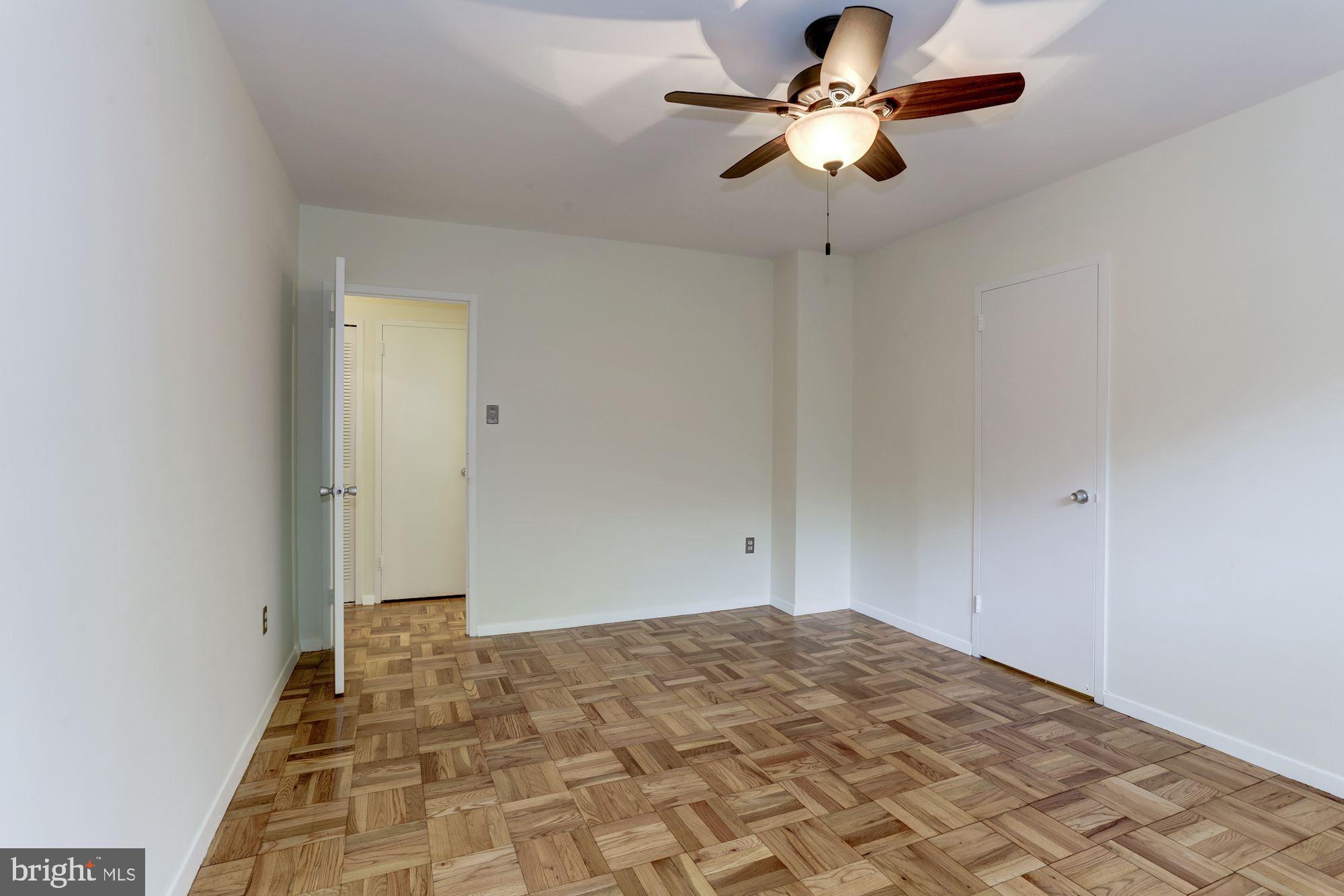 4000 Tunlaw Road Northwest, Unit 227 Washington, DC 20007 - Photo 12 of 24 Bedroom with walk in closet