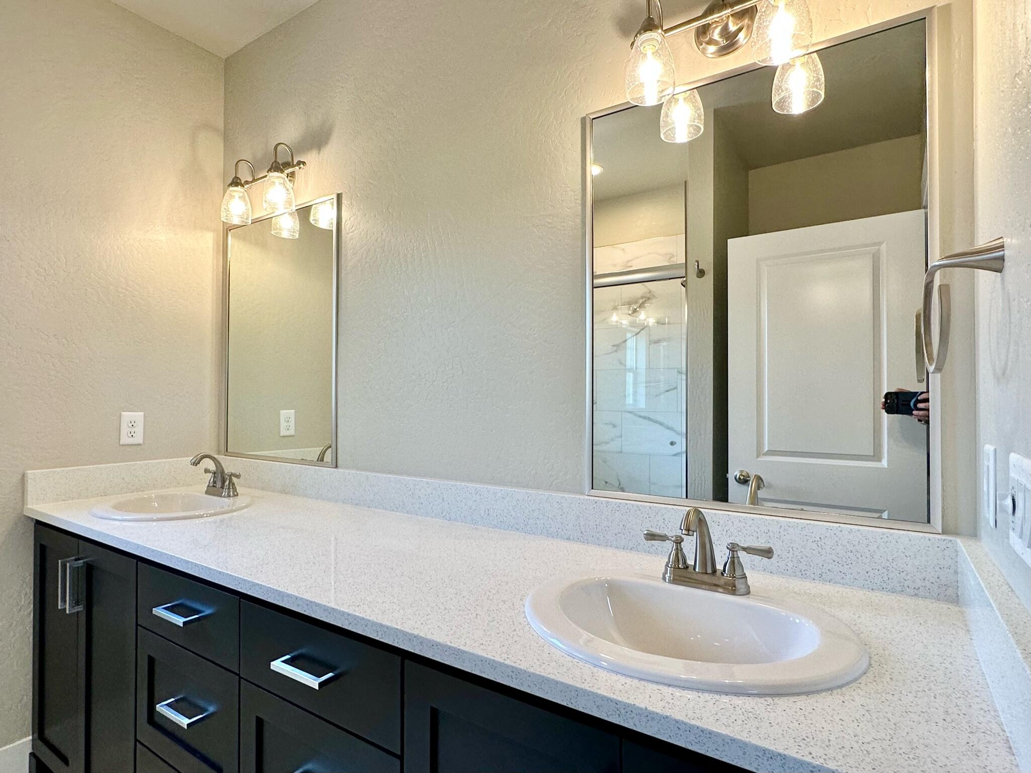 281 Autumn Ridge Road Talent, OR 97540 - Photo 20 of 39 a bathroom with a sink double vanity and a mirror