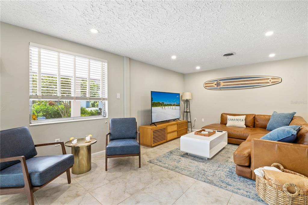 2365 Bay Street Sarasota, FL 34237 - Photo 14 of 93 a living room with furniture and a large window