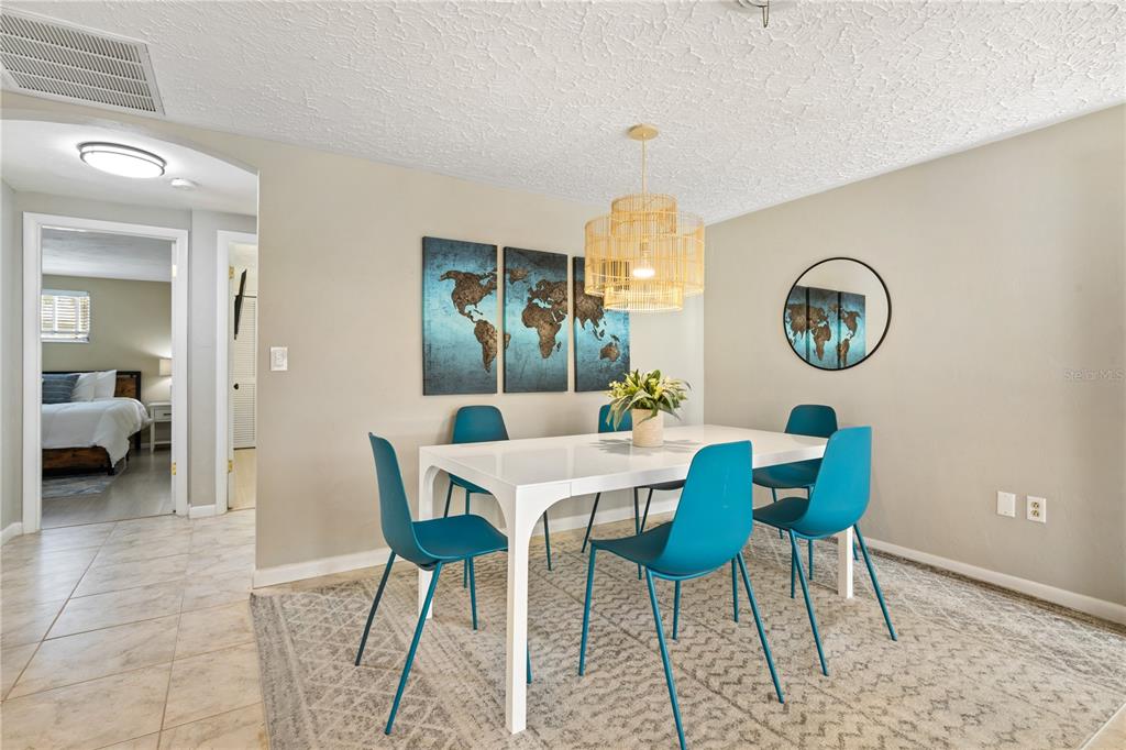 2365 Bay Street Sarasota, FL 34237 - Photo 16 of 93 a view of a livingroom with furniture and a table in it