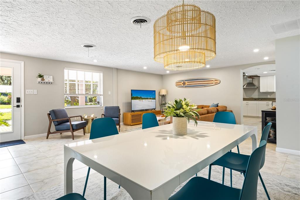 2365 Bay Street Sarasota, FL 34237 - Photo 18 of 93 a view of a dining room with furniture and a chandelier