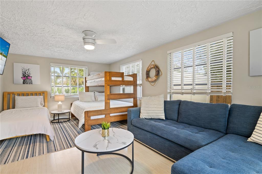 2365 Bay Street Sarasota, FL 34237 - Photo 25 of 93 a living room with furniture and a large window