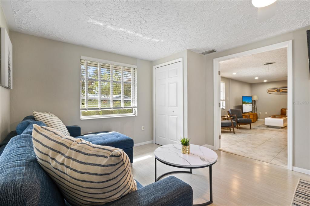 2365 Bay Street Sarasota, FL 34237 - Photo 26 of 93 a living room with furniture and a table