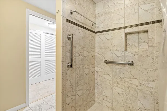 a view of a swimming pool with a patio