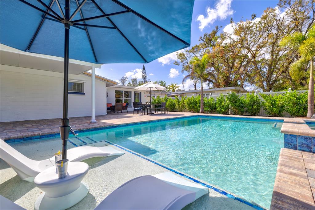 2365 Bay Street Sarasota, FL 34237 - Photo 40 of 93 a view of a swimming pool with a patio