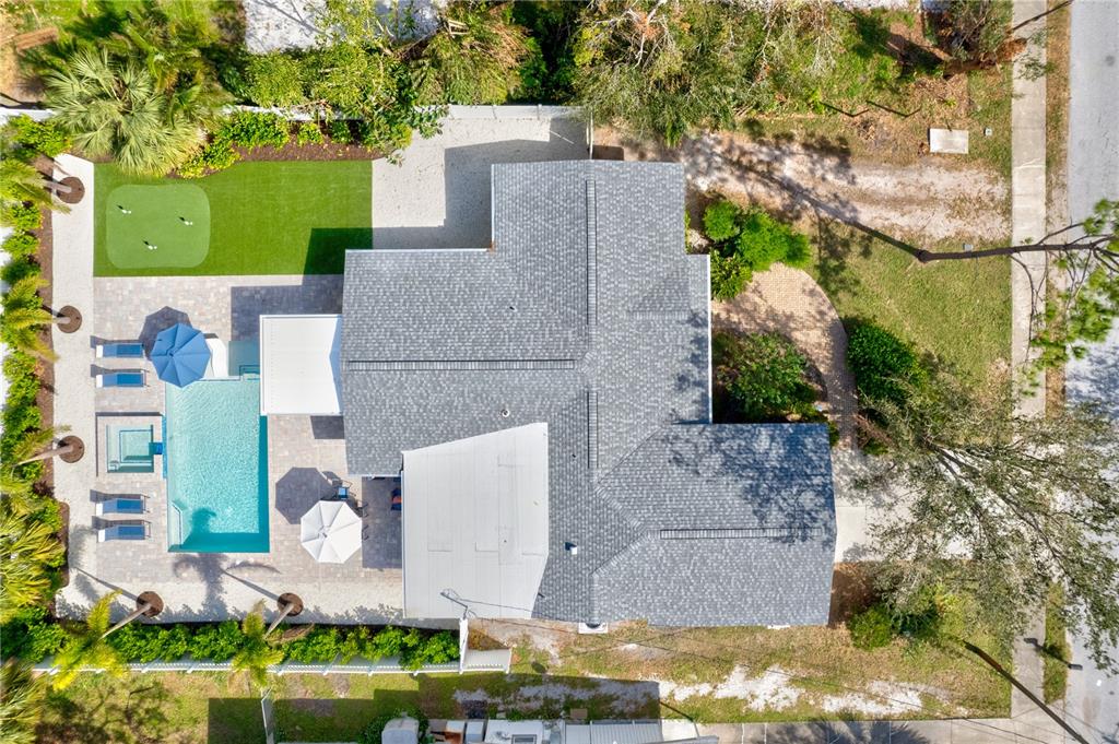 2365 Bay Street Sarasota, FL 34237 - Photo 42 of 93 an aerial view of a house with a yard and lake view