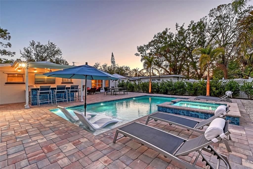 2365 Bay Street Sarasota, FL 34237 - Photo 49 of 93 a view of house with swimming pool and a yard