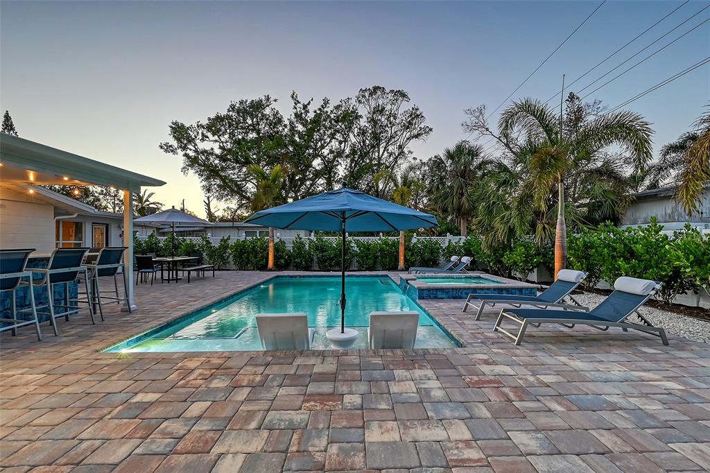 2365 Bay Street Sarasota, FL 34237 - Photo 51 of 93 a swimming pool with outdoor seating yard and barbeque oven