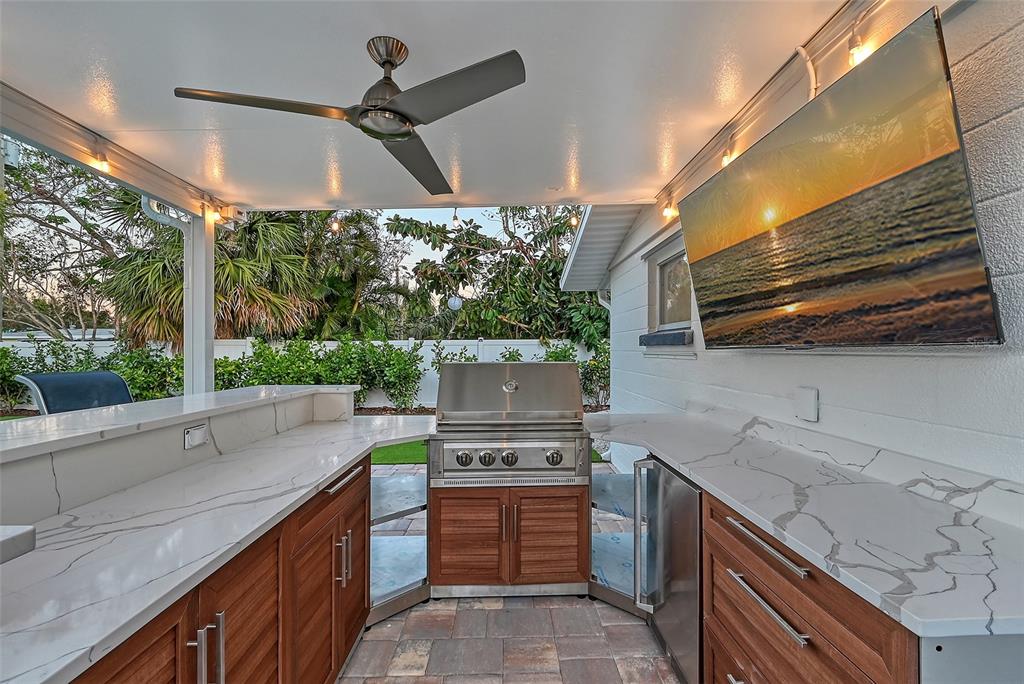 2365 Bay Street Sarasota, FL 34237 - Photo 63 of 93 a kitchen with a stove a sink and a refrigerator